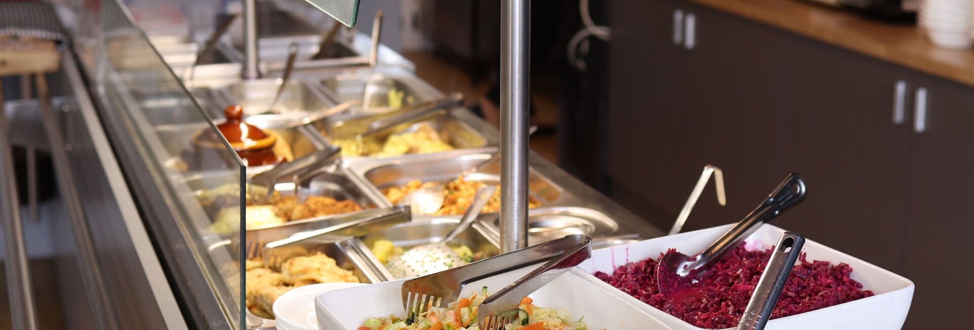 Pexels | ID: 36627080 | Description: Salad bar with diverse dishes in a modern cafeteria. Ideal for restaurant visuals. | User: Valeria Boltneva | URL: https://www.pexels.com/photo/buffet-salad-bar-in-modern-cafeteria-setting-36627080/